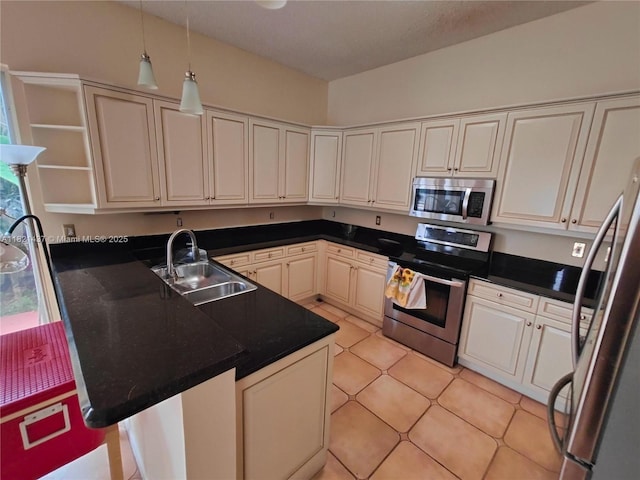 15651 NW 14th Ct, Pembroke Pines, FL 33028 - kitchen featuring appliances with stainless steel finishes, a peninsula, open shelves, hanging light fixtures, and dark countertops