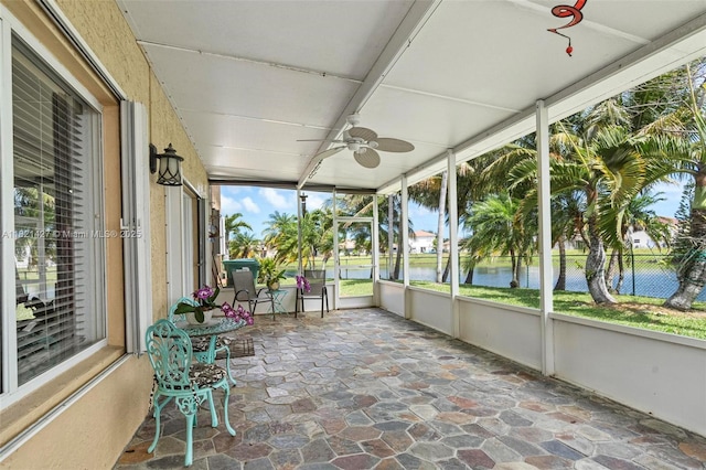 21343 SW 88th Ct, Cutler Bay, FL 33189 - unfurnished sunroom featuring a ceiling fan and a water view