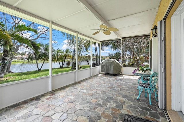 21343 SW 88th Ct, Cutler Bay, FL 33189 - unfurnished sunroom featuring a ceiling fan and a water view