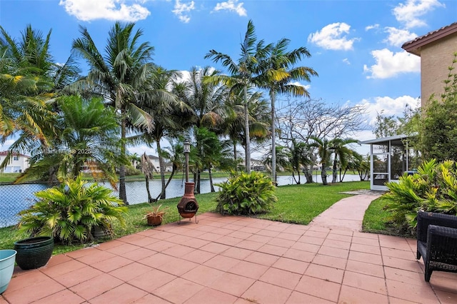 21343 SW 88th Ct, Cutler Bay, FL 33189 - view of patio / terrace with a water view and a sunroom