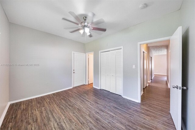 6428 Plunkett St, Hollywood, FL 33023 - unfurnished bedroom with wood finished floors, a closet, and ceiling fan