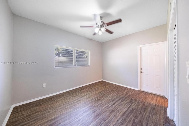 6428 Plunkett St, Hollywood, FL 33023 - empty room featuring a ceiling fan and dark wood-type flooring