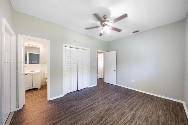6428 Plunkett St, Hollywood, FL 33023 - unfurnished bedroom featuring dark wood-style floors, a closet, and a ceiling fan