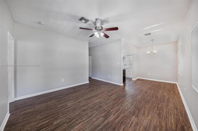 6428 Plunkett St, Hollywood, FL 33023 - unfurnished living room with a chandelier, ceiling fan, and dark wood-style floors