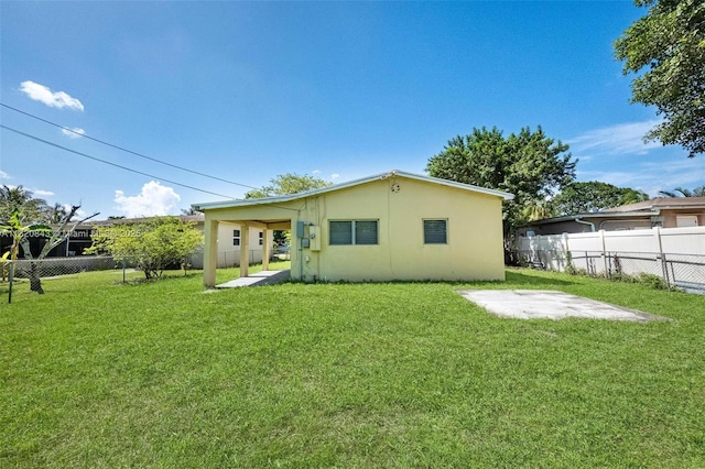 6428 Plunkett St, Hollywood, FL 33023 - rear view of house featuring a patio area, a fenced backyard, and stucco siding