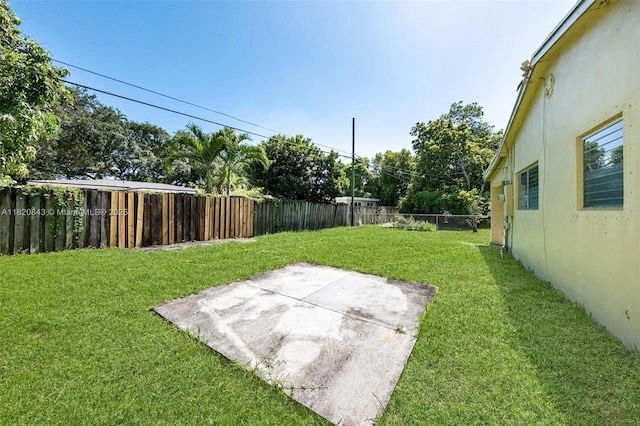 6428 Plunkett St, Hollywood, FL 33023 - fenced backyard with a patio area