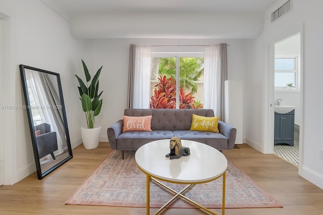 1200 Euclid Ave Unit 103, Miami Beach, FL 33139 - living room with light wood-style flooring and baseboards