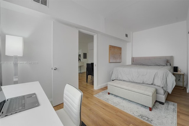 1200 Euclid Ave Unit 103, Miami Beach, FL 33139 - bedroom with light wood finished floors and a desk