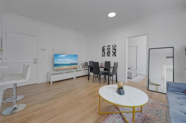 1200 Euclid Ave Unit 103, Miami Beach, FL 33139 - living room with ornamental molding and light wood-style floors