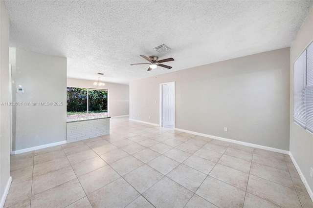 6442 Oak St, Hollywood, FL 33024 - unfurnished room with ceiling fan, a textured ceiling, and light tile patterned floors