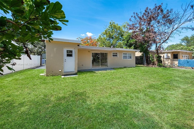 6442 Oak St, Hollywood, FL 33024 - back of house featuring stucco siding