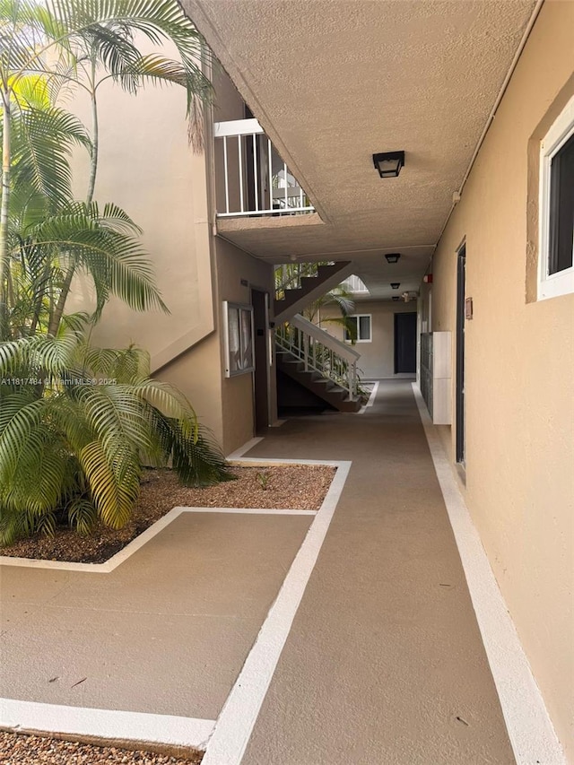 7840 Camino Real Unit P312, Miami, FL 33143 - corridor featuring stairs