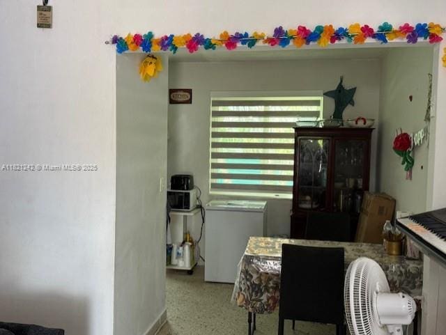 67 NW 34th St, Miami, FL 33127 - dining room with speckle patterned floor