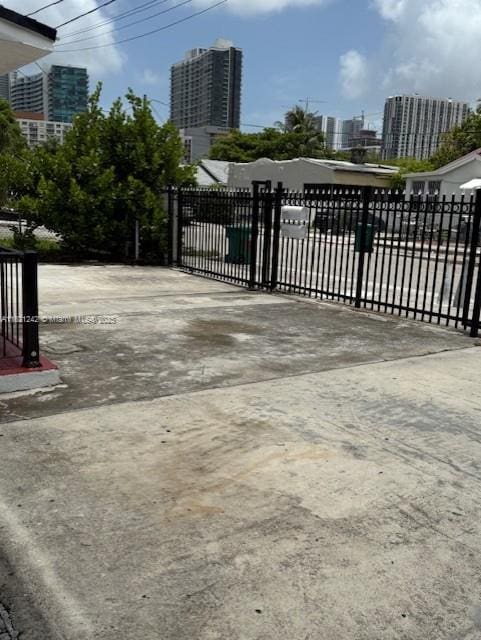 67 NW 34th St, Miami, FL 33127 - gate featuring a view of city