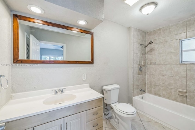 4818 NW 8th St, Plantation, FL 33317 - bathroom featuring vanity, shower / bathtub combination, tile patterned floors, and a textured wall