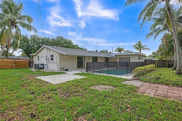 4818 NW 8th St, Plantation, FL 33317 - rear view of house with a patio area, stucco siding, and a fenced backyard