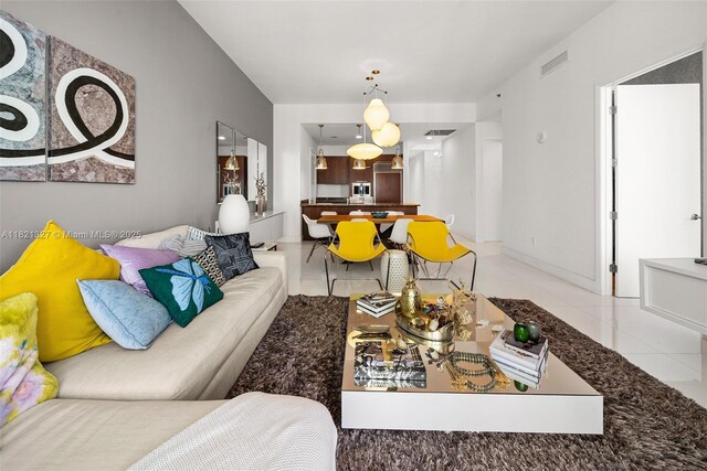 15901 Collins Ave Unit 3302, Sunny Isles Beach, FL 33160 - living room featuring light tile patterned flooring