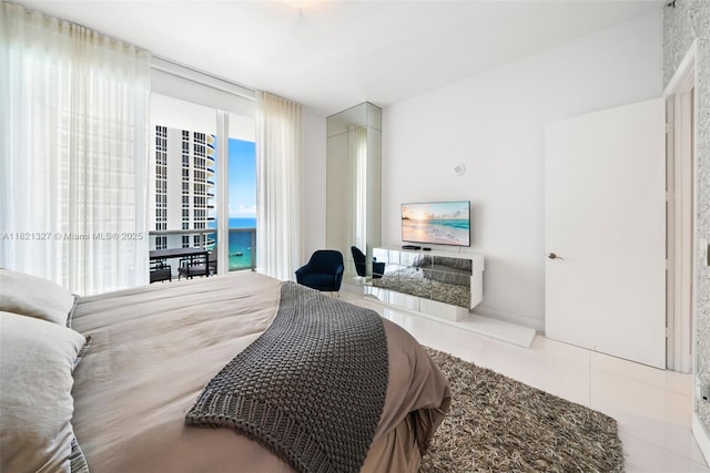 15901 Collins Ave Unit 3302, Sunny Isles Beach, FL 33160 - bedroom with tile patterned flooring and access to outside
