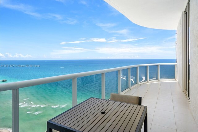 15901 Collins Ave Unit 3302, Sunny Isles Beach, FL 33160 - balcony with a water view and outdoor dining space