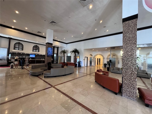 19201 N Collins Ave Unit 826, Sunny Isles Beach, FL 33160 - lobby featuring crown molding and recessed lighting