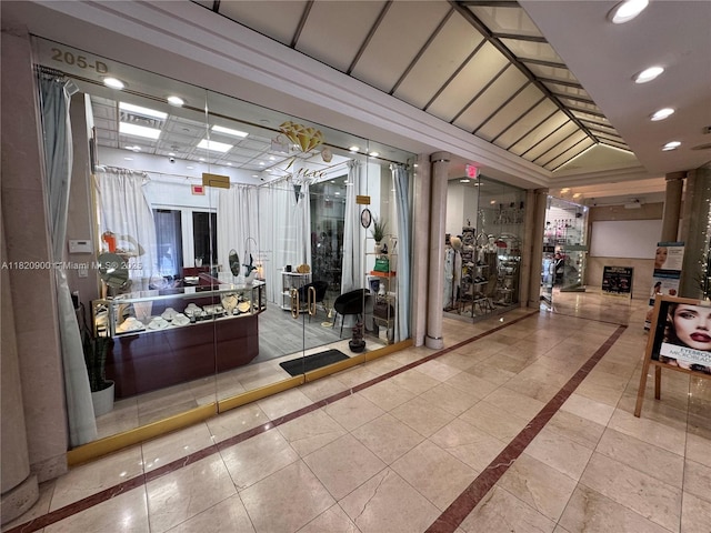 19201 N Collins Ave Unit 826, Sunny Isles Beach, FL 33160 - workout area featuring inlaid floor details and tile patterned floors
