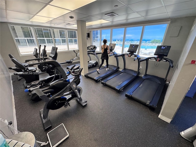 19201 N Collins Ave Unit 826, Sunny Isles Beach, FL 33160 - exercise room featuring a paneled ceiling