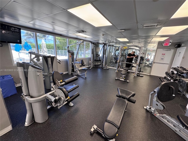 19201 N Collins Ave Unit 826, Sunny Isles Beach, FL 33160 - gym with a drop ceiling and baseboards