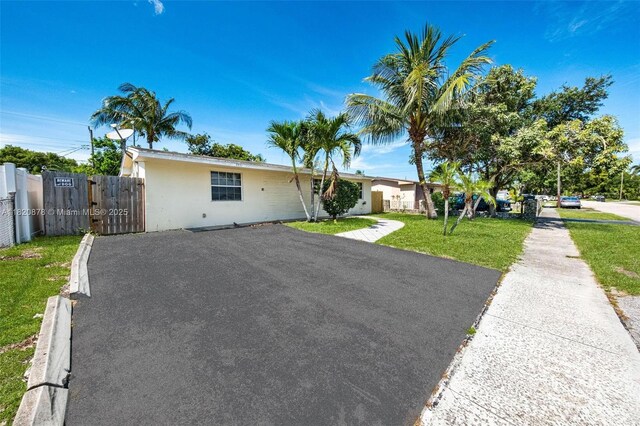 7771 Simms St, Hollywood, FL 33024 - ranch-style home with stucco siding