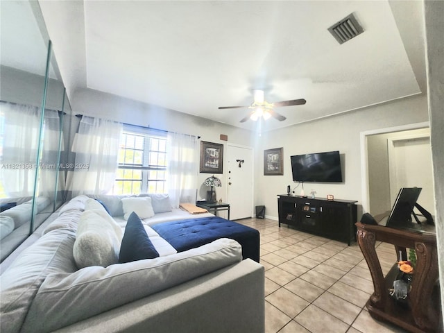 3082 NW 4th St, Miami, FL 33125 - living area featuring light tile patterned flooring and a ceiling fan