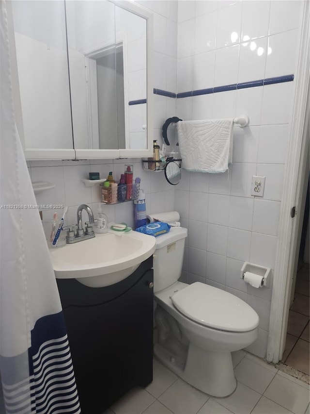 3082 NW 4th St, Miami, FL 33125 - bathroom with vanity, tile walls, tile patterned flooring, and tasteful backsplash