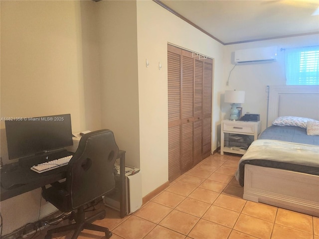 3082 NW 4th St, Miami, FL 33125 - bedroom featuring a wall unit AC, light tile patterned flooring, a closet, an office area, and crown molding