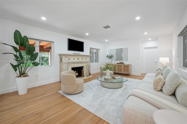 5211 Granada Blvd, Coral Gables, FL 33146 - living area with wood finished floors, recessed lighting, and a fireplace