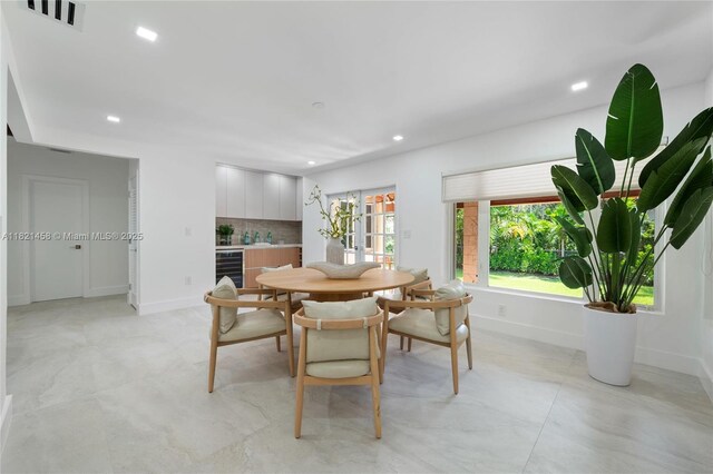5211 Granada Blvd, Coral Gables, FL 33146 - dining area featuring recessed lighting and beverage cooler
