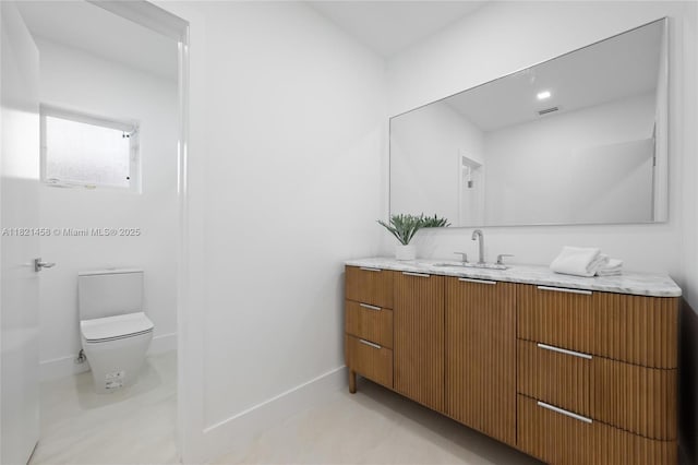 5211 Granada Blvd, Coral Gables, FL 33146 - bathroom with vanity and toilet