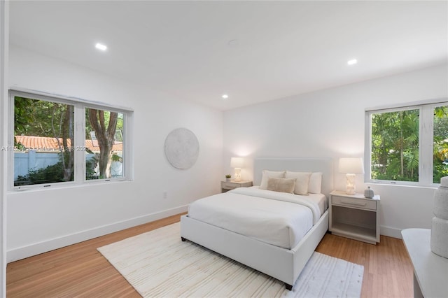 5211 Granada Blvd, Coral Gables, FL 33146 - bedroom with light wood finished floors and recessed lighting