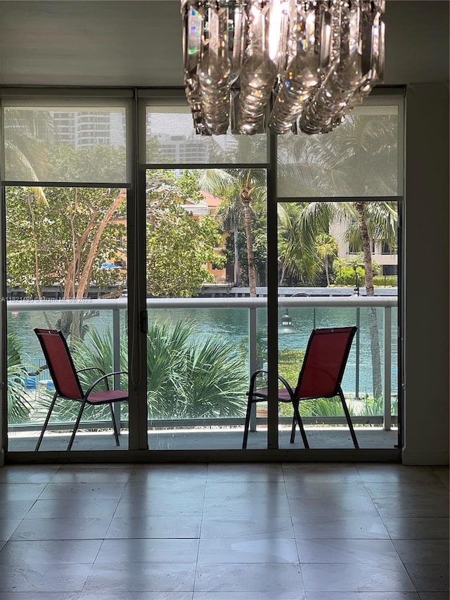 19390 Collins Ave Unit 207, Sunny Isles Beach, FL 33160 - doorway to outside featuring tile patterned floors