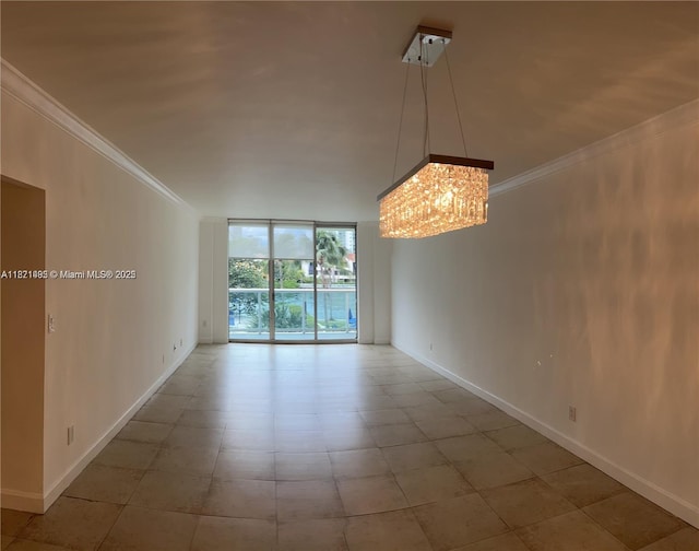 19390 Collins Ave Unit 207, Sunny Isles Beach, FL 33160 - empty room with floor to ceiling windows, ornamental molding, and a chandelier