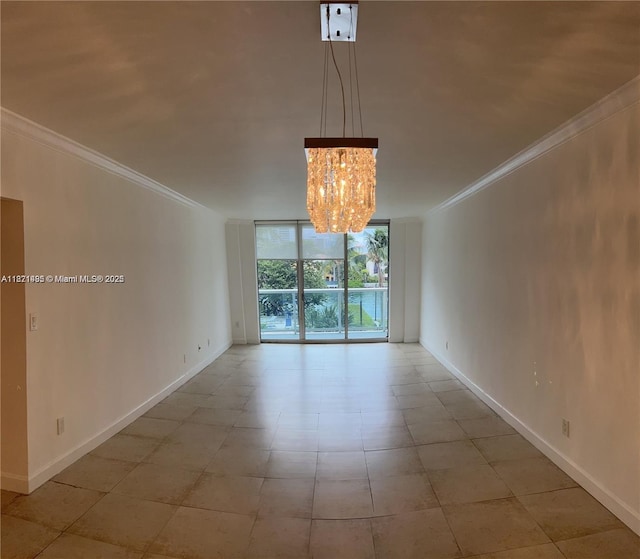 19390 Collins Ave Unit 207, Sunny Isles Beach, FL 33160 - unfurnished room featuring floor to ceiling windows, ornamental molding, and a chandelier