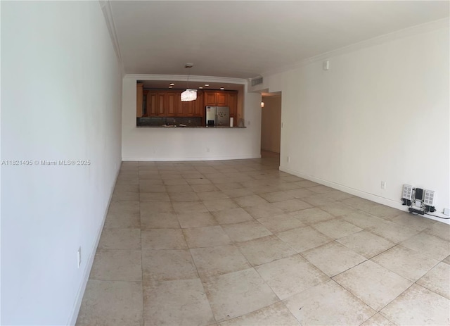 19390 Collins Ave Unit 207, Sunny Isles Beach, FL 33160 - unfurnished living room featuring crown molding and light tile patterned floors