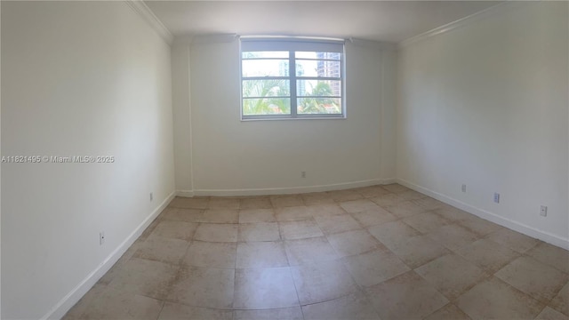 19390 Collins Ave Unit 207, Sunny Isles Beach, FL 33160 - spare room featuring ornamental molding