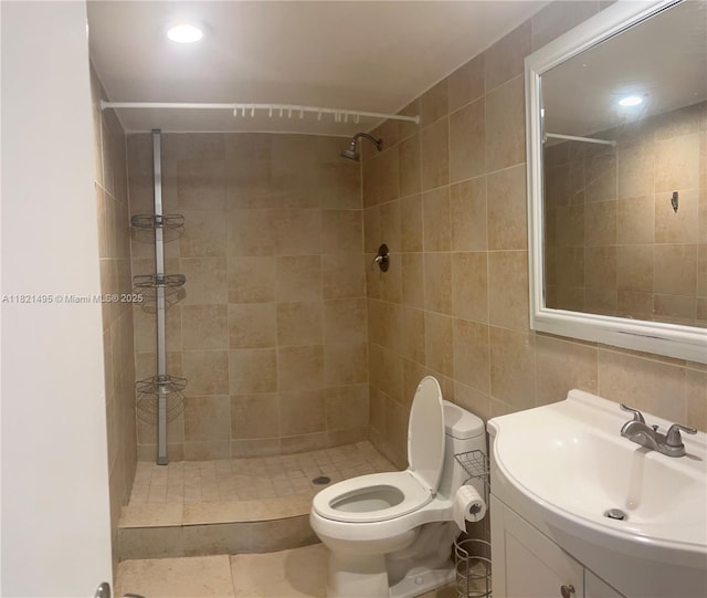 19390 Collins Ave Unit 207, Sunny Isles Beach, FL 33160 - full bathroom with a shower stall, vanity, and tile walls
