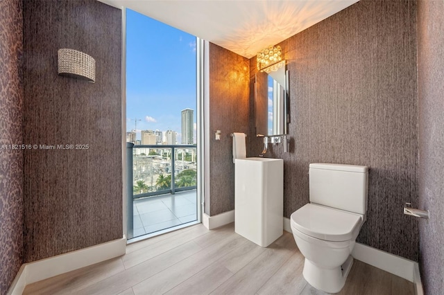185 SW 7th St Unit 803, Miami, FL 33130 - bathroom featuring wood finished floors and a view of city