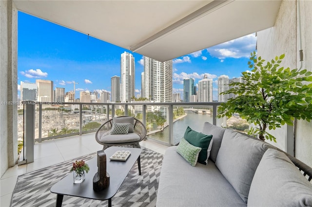 185 SW 7th St Unit 803, Miami, FL 33130 - balcony with a view of skyline and outdoor lounge area