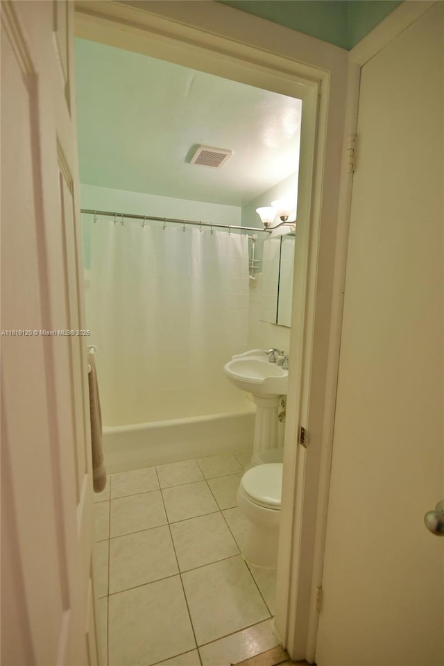 5815 S Farragut Dr, Hollywood, FL 33021 - full bathroom featuring tile patterned flooring and shower / bathtub combination with curtain