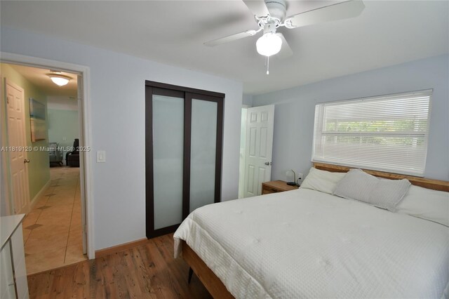 5815 S Farragut Dr, Hollywood, FL 33021 - bedroom featuring a closet, a ceiling fan, and wood finished floors