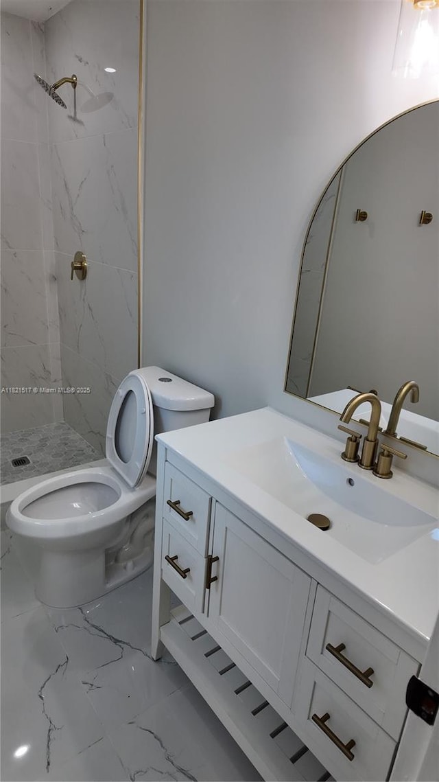 4521 SW 25th Ter, Dania Beach, FL 33312 - bathroom featuring marble finish floors, vanity, and a marble finish shower