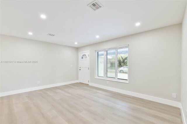 4521 SW 25th Ter, Dania Beach, FL 33312 - unfurnished room with recessed lighting and light wood-type flooring