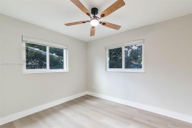 4521 SW 25th Ter, Dania Beach, FL 33312 - empty room with a ceiling fan and wood finished floors