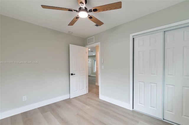 4521 SW 25th Ter, Dania Beach, FL 33312 - unfurnished bedroom featuring light wood-style floors, a closet, and ceiling fan