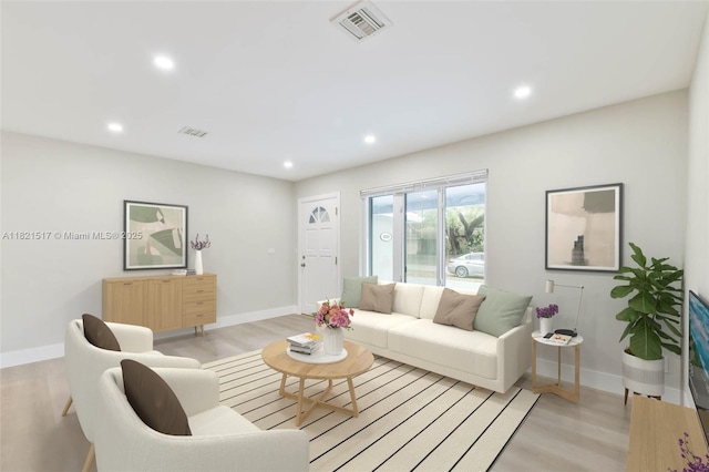 4521 SW 25th Ter, Dania Beach, FL 33312 - living room featuring light wood finished floors and recessed lighting